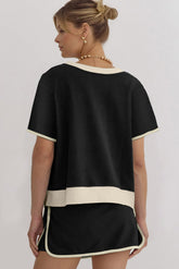 Hazel Blues® | Black Sequin Football Bow Patched Colorblock Edge Tee and Skort Set